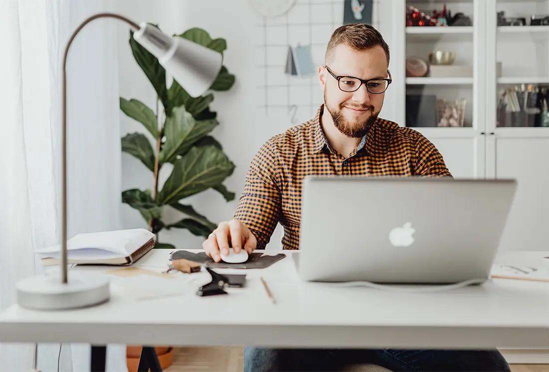 A boy with laptop, the best freelance digital marketing analyst in calicut